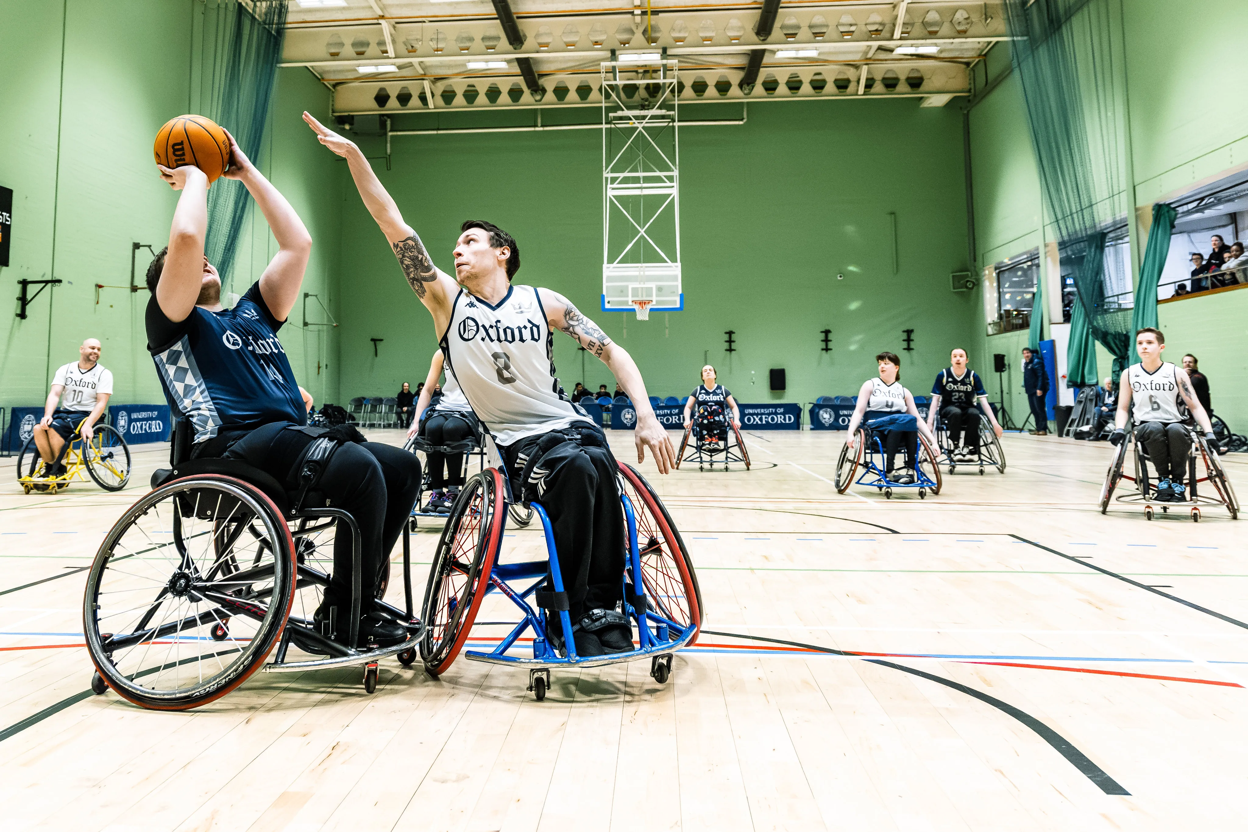 Oxford Kites wheelchair basketball players contesting a shot