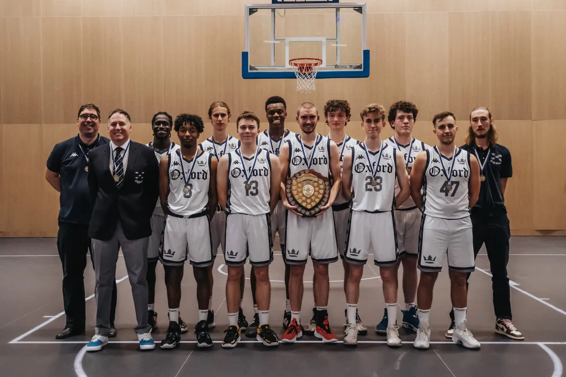 BACK ROW: Dr Mathias Rufino (Assistant Coach), Akin Akinlabi, Louis Buck, Sam Ajakaiye, Josh Hayward, Josh Soifer, Matthew Mackay (Assistant Coach). FRONT ROW: Jamie Smith (Head Coach), Rocco Lofinmakin-Dutta, Karl Baddeley, Orin Varley (Captain), Ed Grayson, Alex Koukouravas.